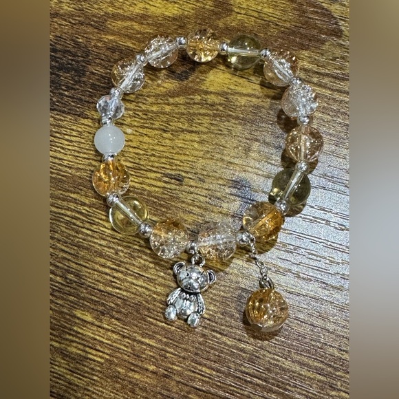 Jewelry - Elegant Gold and Silver Beaded Bracelet with Bear Charm